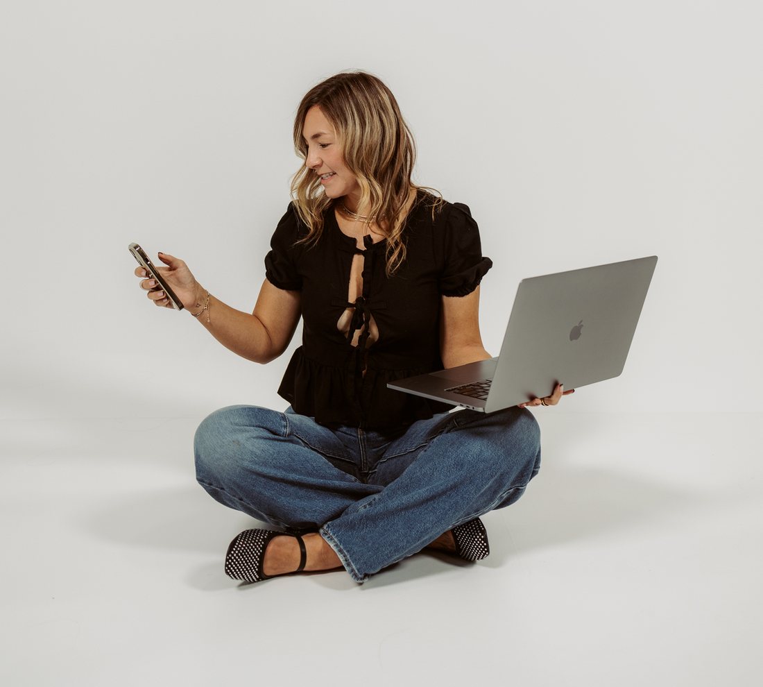 Tamra working across phone and laptop