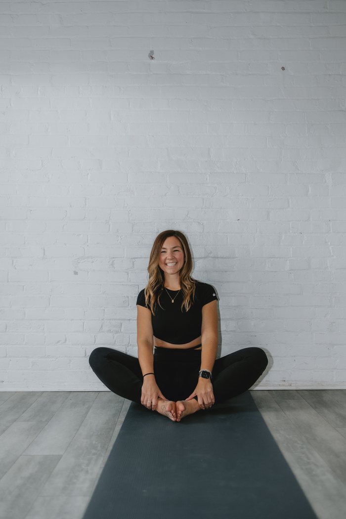 Tamra Fisher teaching yoga
